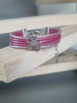 Bracelet enfant en cuir rond rose avec passant ourson en zamak argenté