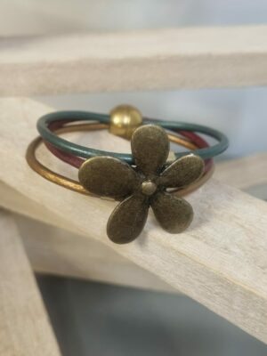 Bracelet femme , trois cuirs ronds et grosse marguerite bronze