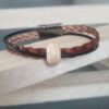 Bracelet mixte en cuir marron et perle céramique beige